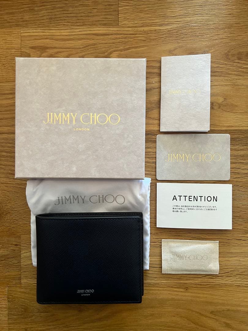 【新品未使用】jimmy choo ジミーチュウ　折り財布　文字柄　ネイビー JIMMY CHOO（ジミーチュウ） 財布 長財布 ラウンドファスナー レザー